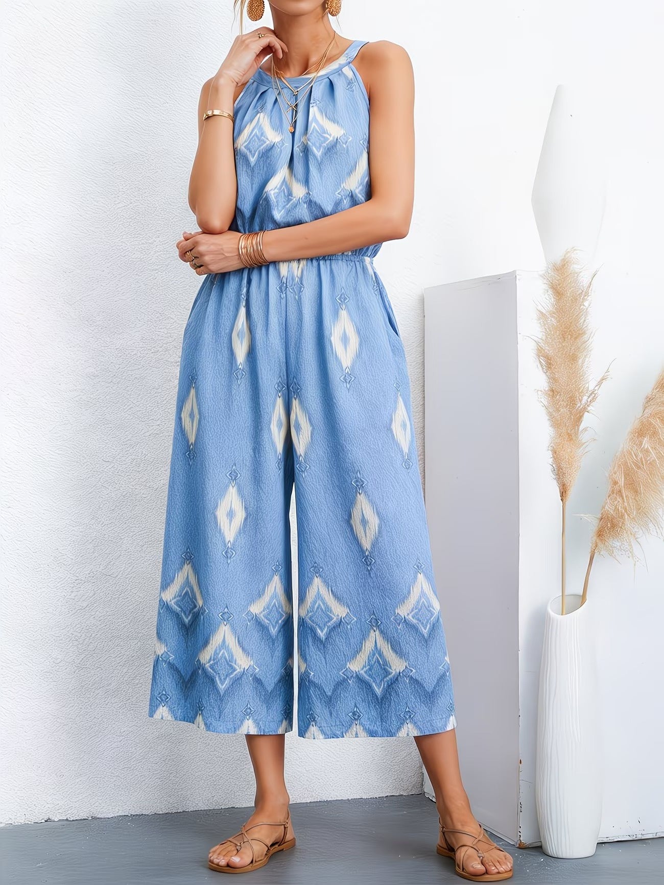 Tuta intera da donna con collo all’americana e gambe ampie cropped